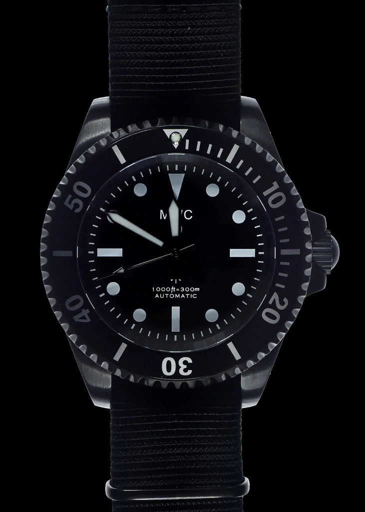 MWC 24 Jewel 1982 Pattern 300m Automatic Military Divers Watch in Black PVD with a Sapphire Crystal on a NATO Webbing Strap (Non Date Version)