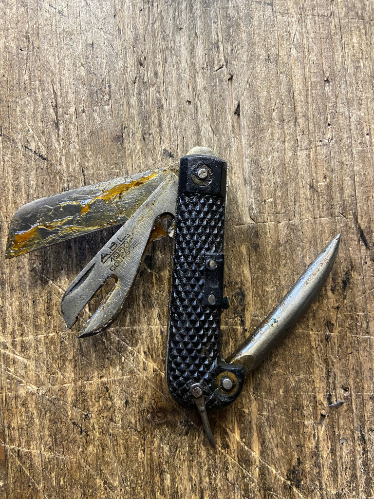 Belgian Army 1950s Jack Knife still in the original Grease